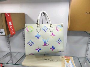 LV MONOGRAM ON THE GO PM WITH BOX