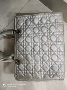 Stylish silver hand bag