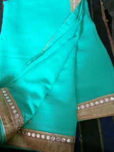Plane Lux Green Saree With Mirror Work Lace