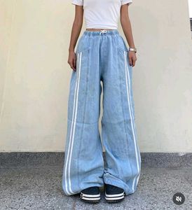 Baggy Side-Striped Denim Jeans.