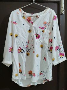 A White floral shirt top