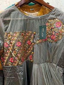 DESIGNER EMBROIDED SILK GOWN WITH SIDE FRILL NET