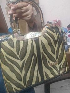 Stylish Designer Zebra Print Handbag for Sale!