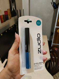 Zudio• Brown Kajal• Blue Eyeliner