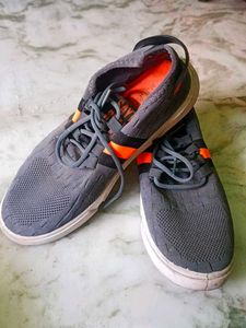 Gray and orange sneakers Ladies