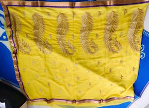 Elegant Yellow Saree with Embellishments