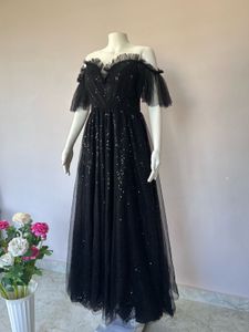 Black sequined Lux gown
