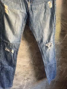 Distressed Denim Jeans