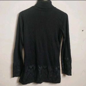 Elegant Black Turtleneck Top with leather print