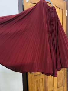 Pleated Maroon full skirt.