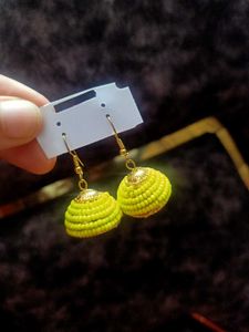 Yellow beaded jhumka earrings