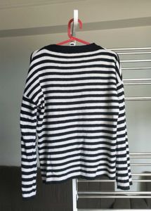 Striped long sleeve sweater.