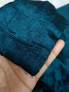 Its a Blue Dress.. With Beads Work On It.