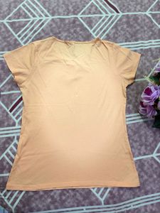 Peach T-shirt with Bow Detail