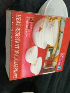 Brand new four piece Stackable  bowl