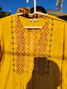 Yellow Embroidered short kurti (offer)