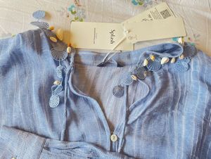 loose fit resort shirt with shell detail