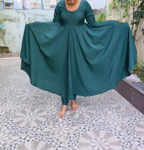 Elegant Green gown with churidar