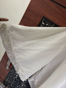 Cape Style Pearl Embellished Top