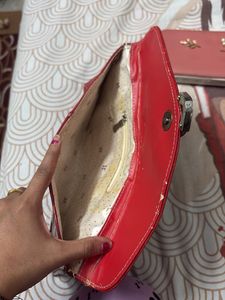 Women red clutch