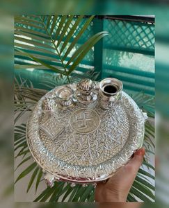 Karva chauth Pooja thali German and silver antique thali mor info inbox me**item code: Swastik pooja thali set**Thali size:Diameter 11”2 katoris1 kalash loti1 deepam