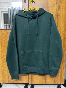 Roadster Solid Green Men Hooded Sweatshirt.