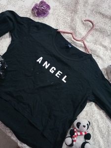 Girls Black Crop Top With Angel Written On It.