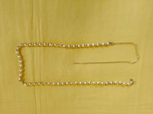 “Elegant Pearl Chain Belt – Statement Waist Access