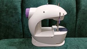 Mini Sewing Machine It' Completely New,Not Used