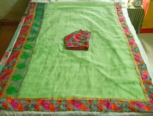 AMARA PISTA GREEN NET GEORGETTE PARTY WEAR SAREE