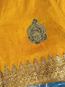 Elegant Yellow &amp; Gold Embellished Saree