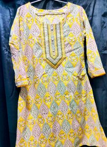 Women's Knee-length Kurta With Embroidered Yoke