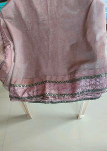mauve net saree with attractive border