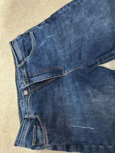 Distressed Denim Jeans