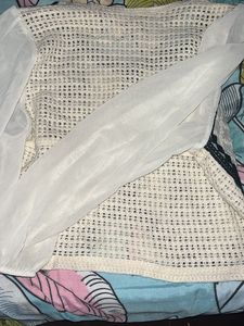I Am Selling A Top With Floral Desing
