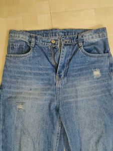 Ripped Light Wash Denim Jeans