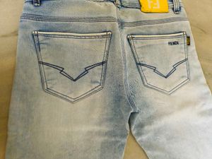Distressed Light Wash Denim Jeans