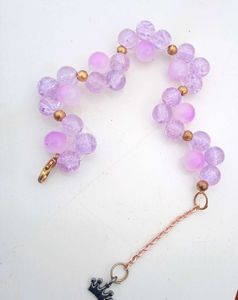 Purple Beaded Bracelet with Crown Charm