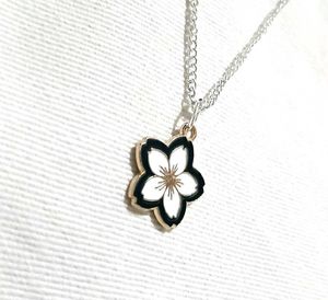 Sakura Noir- Minimalist Cherry Blossom Pendent⚘️