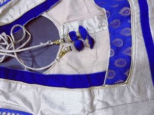 Half net saree with stiched blouse and peticoat