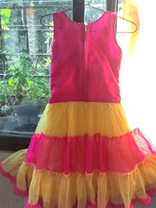 Girls Dress/Frock Yellow And Pink #under500.           It Has A Small But It's Not noticeable