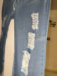 Ripped High-Waisted STREACHABLE Jeans