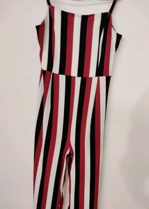 fitted bodice and down to elongated flared Pants
