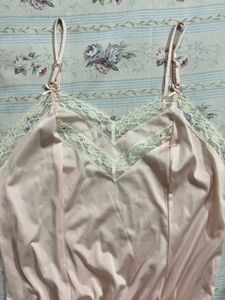 Vintage-Inspired Pink Satin Romper with Lace Trim