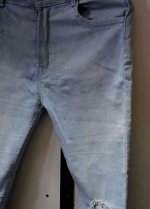 Ripped Knee Light Wash Jeans