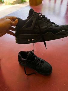 Air Jordan 4 Retro “Black Cat”