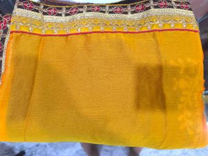 Elegant Yellow and Brown Embroidered Saree