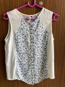 Beautiful Sleeveless White Button Down Shirt