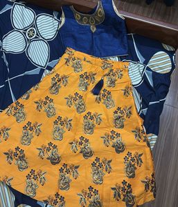 Elegant Blue Embroidered Blouse with Yellow print