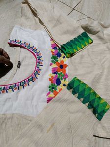Floral Embroidered Kurti- Green patterned Hem